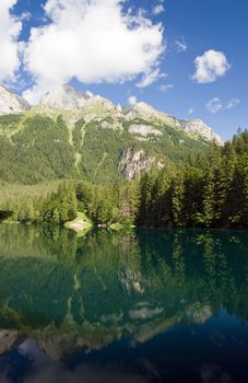 summer view of a beautiful lake in Italian alps