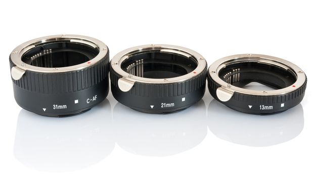 set of extension tube used for macro photography isolated on white background
