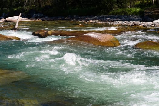 big stones in the stream 
