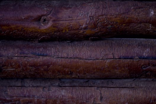 close-up on dark and old wood logs pattern