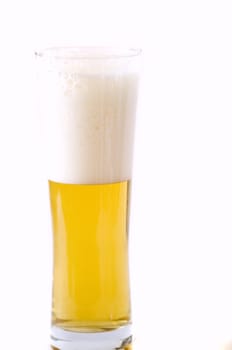 glass of foamy fresh blonde beer, isolated on white, copy space