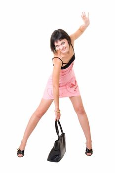 beautiful woman in a little pink dress with a black handbag, isolated on white