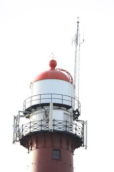 A vintage steel lighthouse in IJmuiden, the Netherlands, built 1878