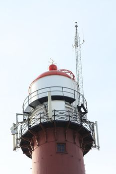 A vintage steel lighthouse in IJmuiden, the Netherlands, built 1878