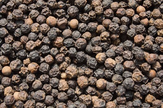 Close up of the black pepper texture. Background.