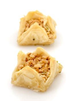 Fresh filo pastries on white background