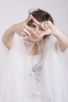 young bride dressed in elegance white wedding dress
