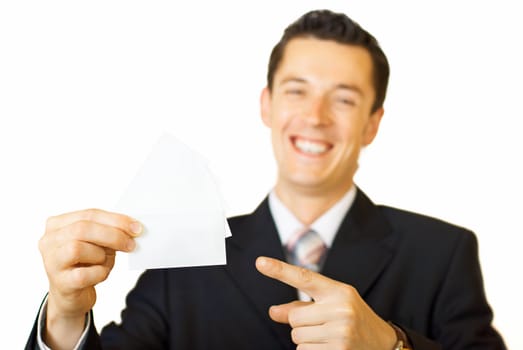 Young businessman holding blank visit card. Backside. Isolated.