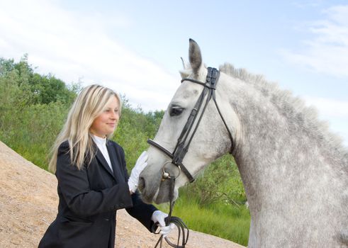 girl with horse.Friendship of an animal and the person