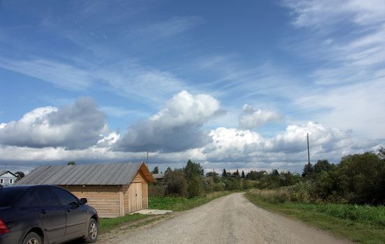 road, sky, car, garage, village