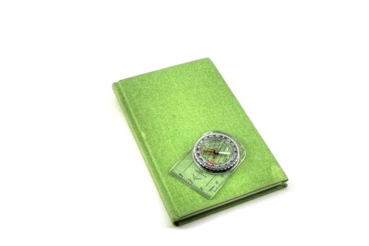 A green travel journal isolated on white.