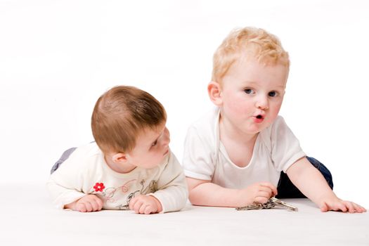 Cute brother and sister from different races having fun together