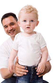 Cute caucasian toddler haves fun with his daddy