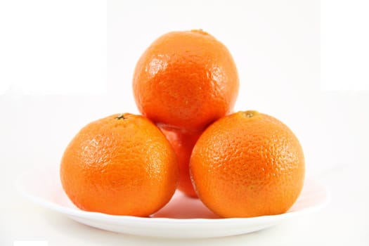 Ripe oranges isolated on a white background..

