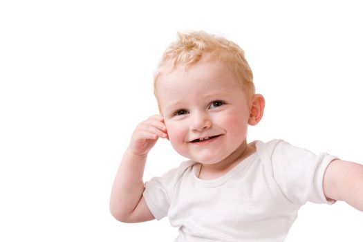 Cute caucasian blond toddler ishappy and playfull