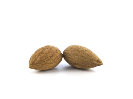 group of almonds isolated on white background