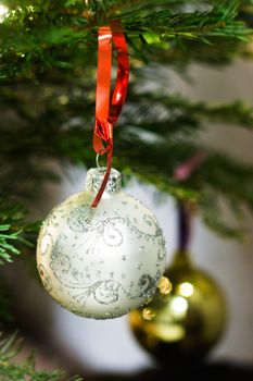 Christmas ball on the fir tree