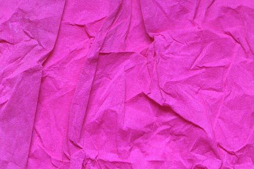 Background made from sheet of crushed pink paper