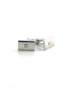 silver cuff link isolated on white background