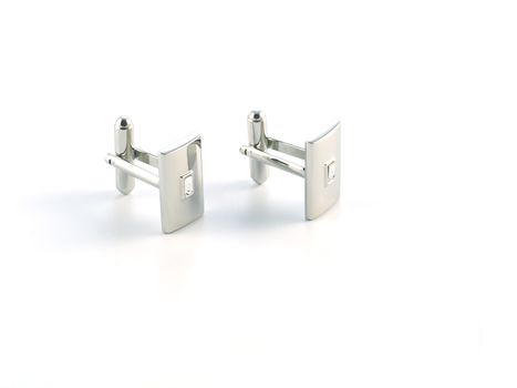 silver cuff link isolated on white background