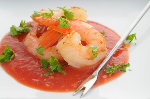 Delicious plate of shrimp and fresh herbs.