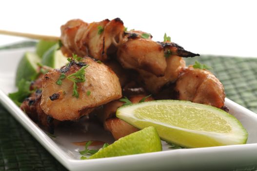 Tasty grilled chicken satay with fresh lime.