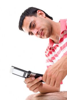 Young man with mobile phone on a white background.