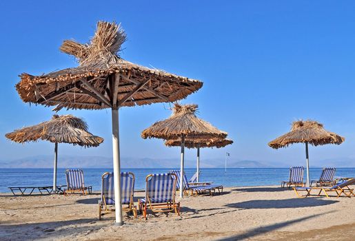 A nice beach in Corfu, Greece after the tourists has left it for the day.