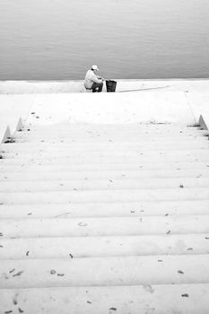 Fisherman go fishing in Vistula River.