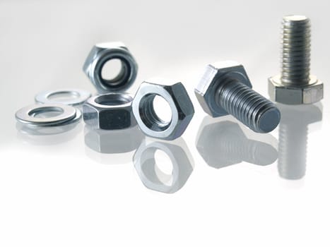 screws and nuts on a white background