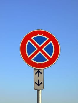 No parking sign isolated over white background - over blue sky background