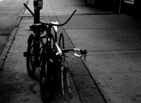 Bikes chained to parking meter