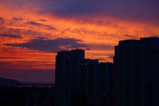 Buildings and sunset sky. Evening silhouettes.