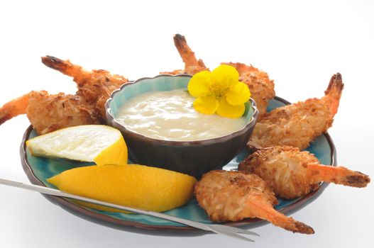 Deep fried shrimp with coconut dipping sauce.