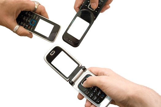 three mobile phones with empty screens on white