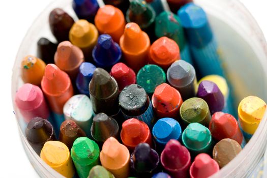 a variety of differrent color old wax crayons 