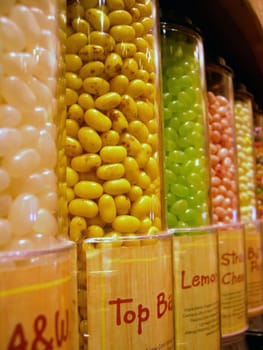 a row of jelly beans in a store