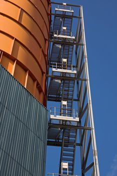 The clean lines of an external stairway on an industrial coal store