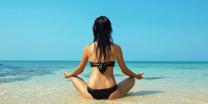 Beautiful women on the beach. Relaxing landscape.