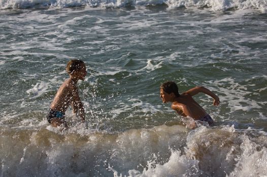 people series: two boy are play the game with water