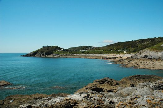 coast of Swansea in Wales with blue sky