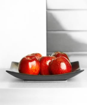 Granny smith apples on table in modern kitchen