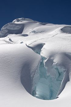 Huge crevasse on classic route to Pisco summit (in the background), Cordillera Blanca, Peru