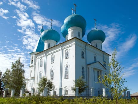 Orthodox church.Arkhangelsk.On a background of the blue sky