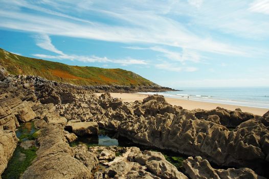 coast of Swansea in Wales with blue sky