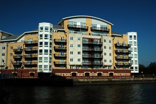 big high building in cardiff bay with blue sky