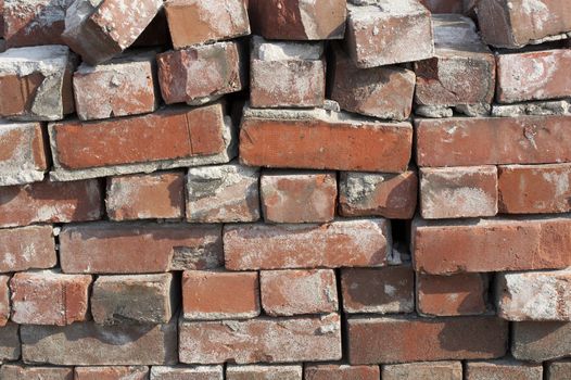 a close up of an old pile of bricks