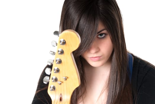 Young female with guitar head on white background.