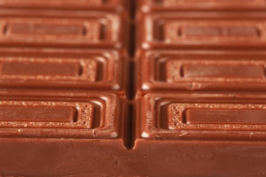 Milk chocolate isolated on white, shot in studio