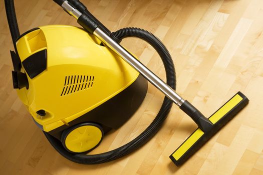 vacuum cleaner on a wooden floor